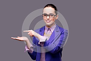 The businesswoman holding hands on gray background