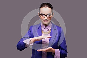 The businesswoman holding hands on gray background