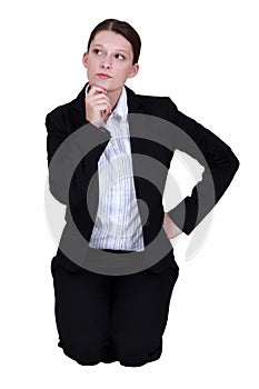 Businesswoman holding her chin