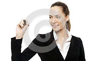 Businesswoman holding a marking pen
