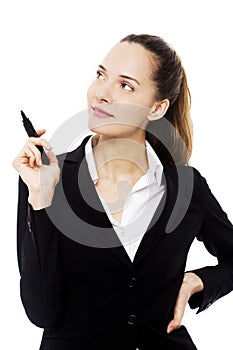 Businesswoman holding a marking pen