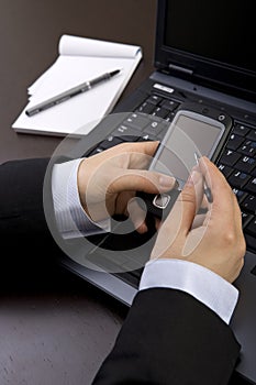 Businesswoman holding modern mobile pda phone