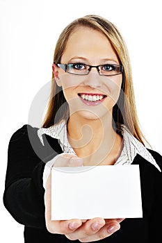 Businesswoman holding out a blank business card