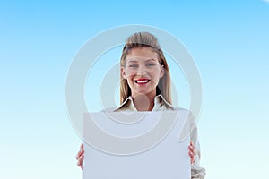 Businesswoman holding a white business card