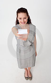 Businesswoman holding a white business card