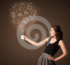 Businesswoman holding a white cup with social media icons