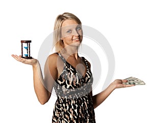 Businesswoman with hourglass and money