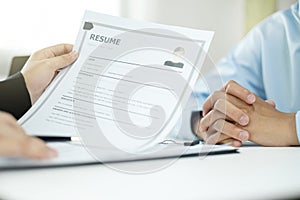 Businesswoman HR Managers people hold a resume and talk to job applicants for job interviews about careers and Their personal