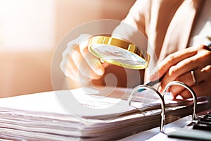 Businesswoman Investigation Finance Using Magnifying Glass