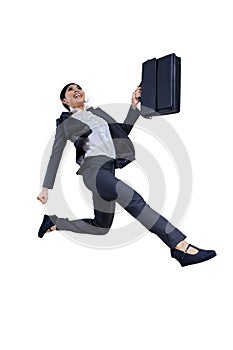 Businesswoman jumping for joy