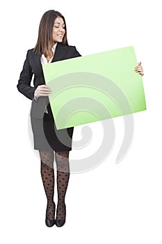 Businesswoman keeping signboard