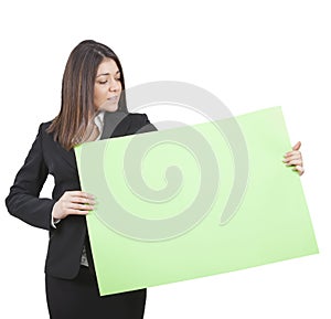 Businesswoman keeping signboard