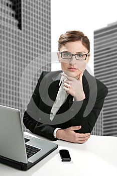 Businesswoman laptop and glasses portrait