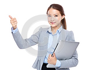 Businesswoman with laptop and prefect sign photo