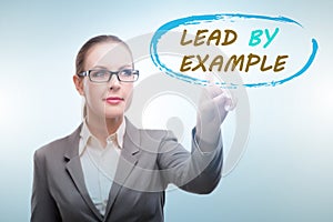 Businesswoman in lead by example concept