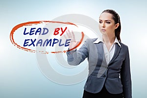 Businesswoman in lead by example concept