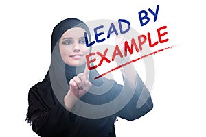 Businesswoman in lead by example concept