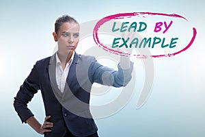 Businesswoman in lead by example concept