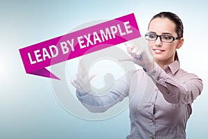 Businesswoman in lead by example concept