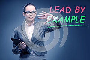 Businesswoman in lead by example concept