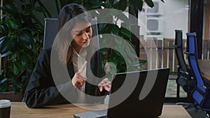 Businesswoman leads online meeting and gestures enthusiastically presenting new project ideas