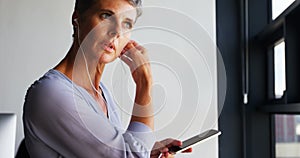 Businesswoman listening music on mobile phone 4k