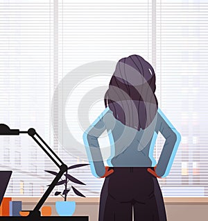 businesswoman looking forward through glass window successful business woman working in office leadership