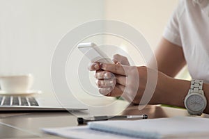 Businesswoman looking important contact on phone