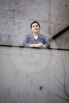 Businesswoman - Looking over wall