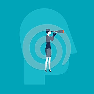 Businesswoman looking with a spyglass inside a head