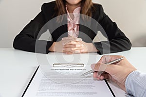 Businesswoman make a decision to sign the employee agreement co