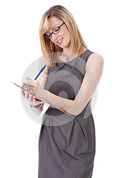 Businesswoman make notes using wooden clipboard