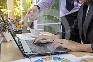 businesswoman and man dicussing data in meeting at office.