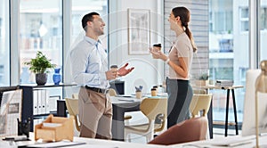 Businesswoman, man and laugh in conversation, talking and office for collaboration or teamwork as colleagues. People