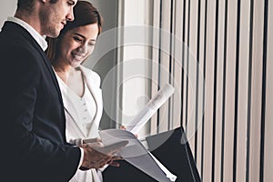 Businesswoman meeting with businessman in office.