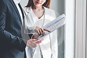 Businesswoman meeting with businessman in office.