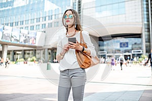 Businesswoman near the parliament building in Brussel