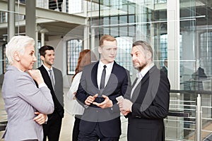 Businesswoman negotiating with business partners