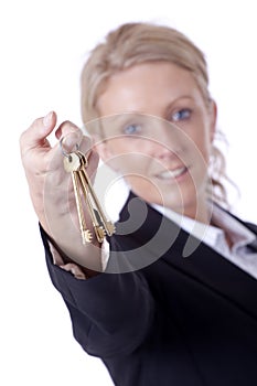 Businesswoman offering keys