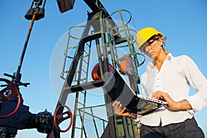 Businesswoman in an oilfield photo