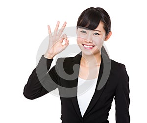 Businesswoman with ok sign