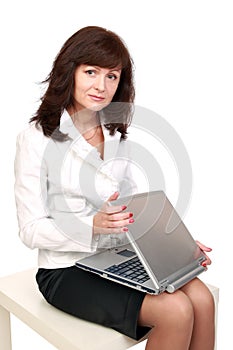 The businesswoman opens laptop