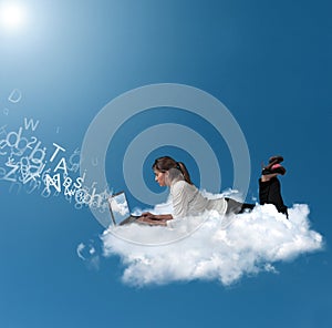 Businesswoman over a cloud