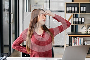 Businesswoman overworked with fatigue