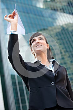 Businesswoman with Paper Plane