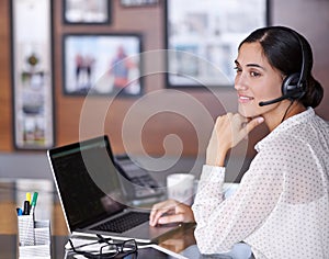 Businesswoman, phone call and headset with laptop, virtual assistant and online in corporate office. Technology