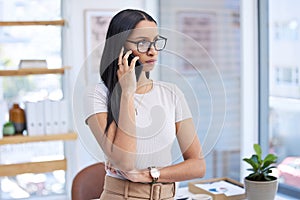 Businesswoman, phone call and serious thinking in office for startup solution, communication or crisis. Female person