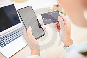 Businesswoman, phone and credit card for online ecommerce payment and bills. Budget, buying and mobile banking with