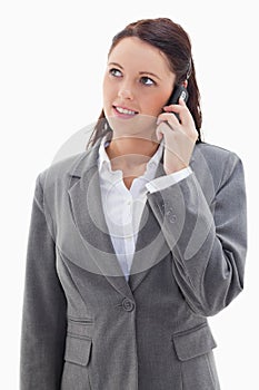 Businesswoman on the phone looking up