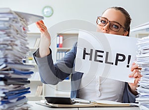 Businesswoman pleading for help in office